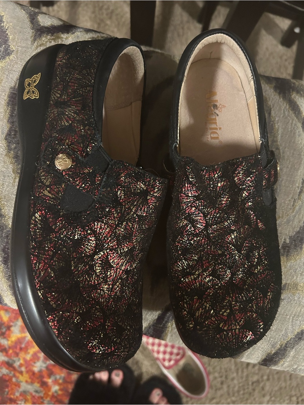 Alegria Black Slip-On Clogs with Metallic Red and Gold Overlay